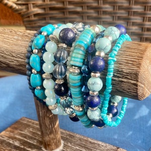 Stackable beaded multilayered stretch bracelet in blues tones