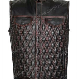 May include: A black leather vest featuring a diamond-quilted pattern across the front panels with contrasting red stitching. The vest includes a mandarin collar, two chest pockets with flaps, and a front button closure. The text craftflairleather.com is visible.