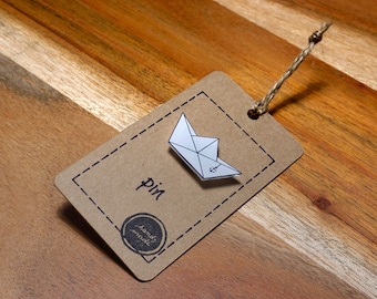 Paper boat pin