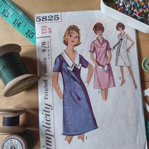 May include: A Simplicity sewing pattern for a dress, featuring a white background with three women wearing dresses. The pattern number is 5825, the size is 16, and the bust size is 36. The text "Simplicity Printed Pattern 4/6" is printed on the left side of the pattern.