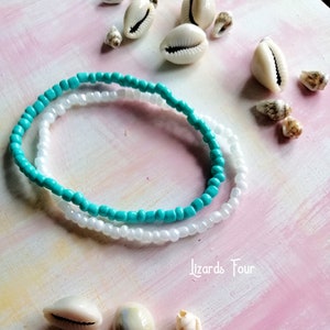 Set van 2 turkoois- en parelwitte enkelbanden met rocailles: boho-stretch enkelband