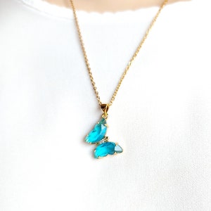 Light Blue Crystal Butterfly Necklace: 18k Plated Stainless Steel Chain