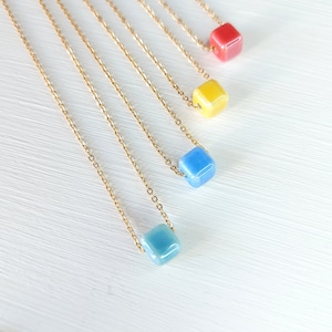 Stainless Steel Cube Necklace: Colorful Ceramic Bead Pendant