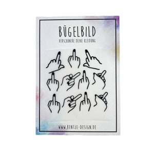 Könnte beinhalten: Eine Bogen Bügelbilder mit weißem Hintergrund und schwarzen Umrissen verschiedener Handgesten, darunter Mittelfinger und Zeigefinger. Der Text "BÜGELBILD" und "VERSCHÖNERE DEINE KLEIDUNG" befindet sich oben auf dem Bogen. Der Text "WWW.BENTJE-DESIGN.DE" befindet sich unten auf dem Bogen.
