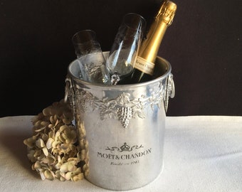 MOET & CHANDON Vintage French metal Champagne, wine cooler, ice bucket. Embossed grapes and engraved Iconic logo. Used but good condition.