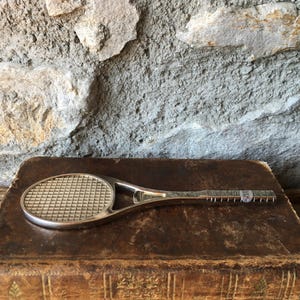 Bouchon raquette de tennis en étain