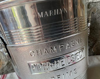 A MARILYN MONROE dedicated Piper-Heidsieck Champagne cooler, ice bucket. It has MARILYN, engraved on 1 side, her New York adress on other