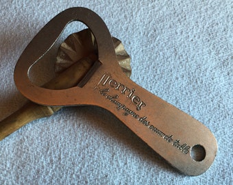 PERRIER, French sparkling water bottle opener, cap lifter. It calls itself the Champagne of table waters.  Metal, 1970’s.