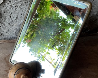 Antique 1930’s French Barber’s  mirror that can either hang or stand. VERY thick beveled glass in very good condition.