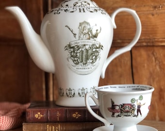 HENDRICK’S GIN tea set, “teapot” and a cup and saucer. Both in perfect condition, but different designs.