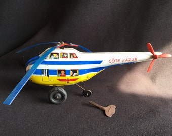 Hélicoptère vintage JOUSTRA en métal français à remonter, Côte d'Azur