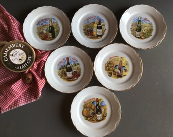 6 French dessert, bread or cheese plates, decorated with different shapes of wine bottles from different wine regions. Vintage made in Paris