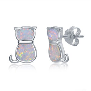 May include: A pair of silver cat-shaped earrings with iridescent opal stones.