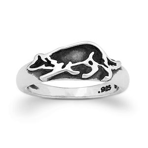 May include: Sterling silver ring with a black enamel design of a raccoon.