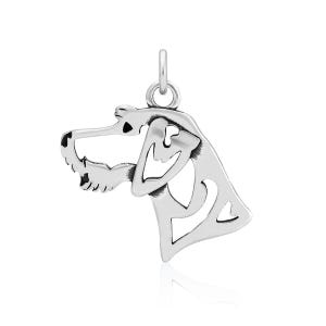 May include: Silver pendant charm in the shape of a wire-frame bloodhound dog.
