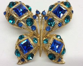 Beautiful Domed Vintage MJent  Shades of Blue Rhinestone and Gold Filigree Brooch