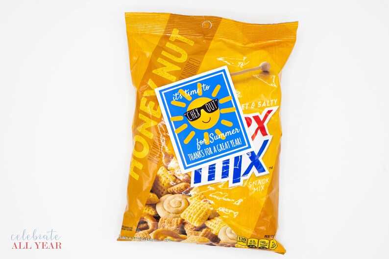 May include: A bag of Honey Nut Chex Mix snack mix with a blue and yellow sun-shaped tag that says "It's time to Chex Out for Summer. Thanks for a great year!"