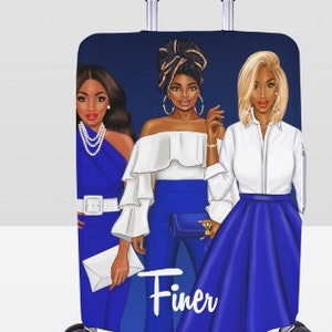 May include: Blue luggage cover with a design of three women in blue and white dresses. The text "Finer" is printed on the cover.