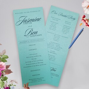 May include: A teal wedding program with the names Jasmine Smith and Ben Johnson, the date December 29, 2019, and the order of the ceremony. The program also includes a list of the bridal party and family members.