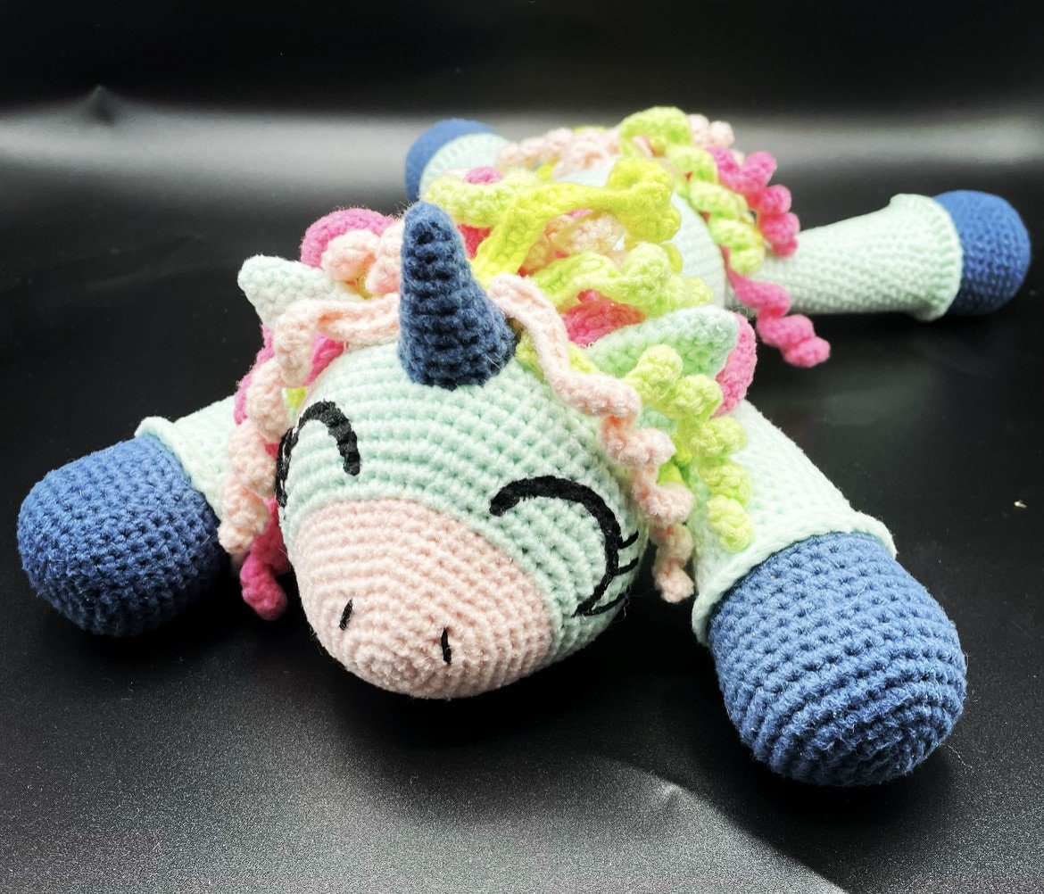 30 Unicorn Crochet Patterns to Spark a Little Handmade Magic 13 Stella the Unicorn Crochet Pattern with Step Photos