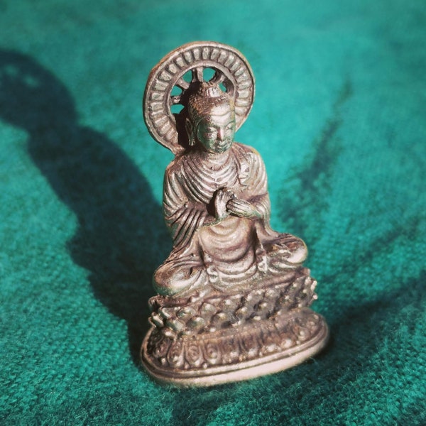 Old, very fine small Tibet. Silver Miniature Buddha Statue