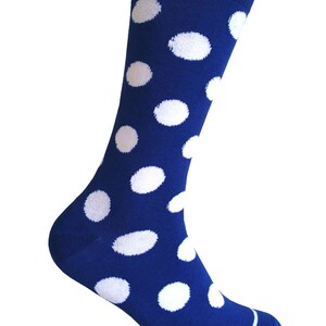 May include: Blue socks with white polka dots.