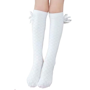 May include: White knee-high socks with a diamond pattern and a bow on the top.