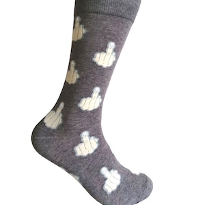 May include: Gray socks with a pattern of white middle fingers.