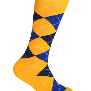 May include: A pair of yellow socks with a blue and black argyle pattern.
