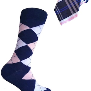 May include: A pair of navy blue socks with a pink and white argyle pattern. A matching navy blue, pink, and white plaid tie is also included.