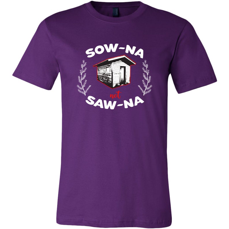 May include: Purple t-shirt with a white graphic of a small house with the text "SOW-NA not SAW-NA" in white with the word "not" in red.
