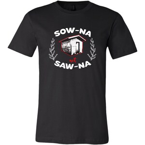 May include: Black t-shirt with a white graphic of a small house and the text "Sow-Na not Saw-Na" in white with a red "not".