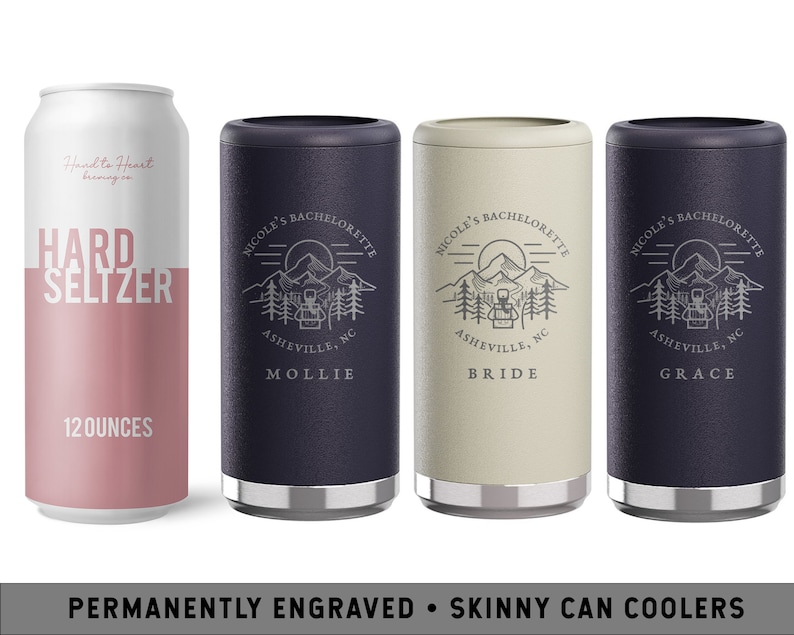 May include: Three personalized skinny can coolers with a mountain scene and the text "Nicole's Bachelorette" engraved on them. The coolers are in navy blue, beige, and gray. The text "Asheville, NC" is engraved below the mountain scene. The names "Mollie", "Bride", and "Grace" are engraved below the city and state.