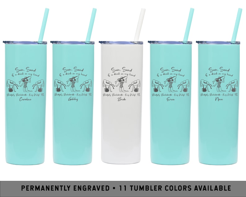 May include: Five turquoise and white stainless steel tumblers with straws. Each tumbler has a black and white graphic of three women in swimsuits with the text "Sun, Sand & a drink in my hand" and a personalized name. The text "Bride's Bachelorette - Key West, FL" is also on each tumbler.