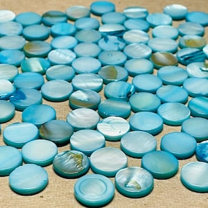 45 cabujones de concha