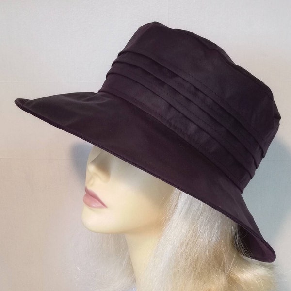 Purple wide brimmed rain hat with pleated waterproof crown, blackcurrant Martha womens wax cotton hat.