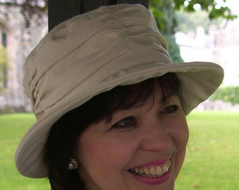 Stone ladies linen sun hat. The Summer Staverton is a ladies small brimmed summer hat, pale beige/stone coloured womens hat.