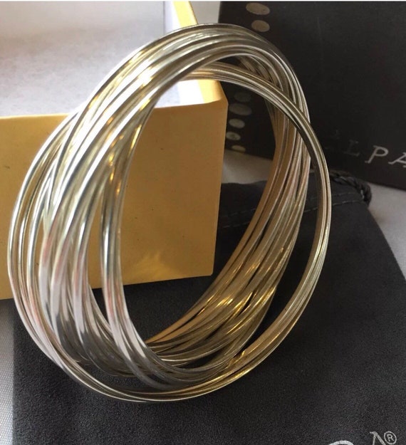 Silpada 21 bangle salute discount