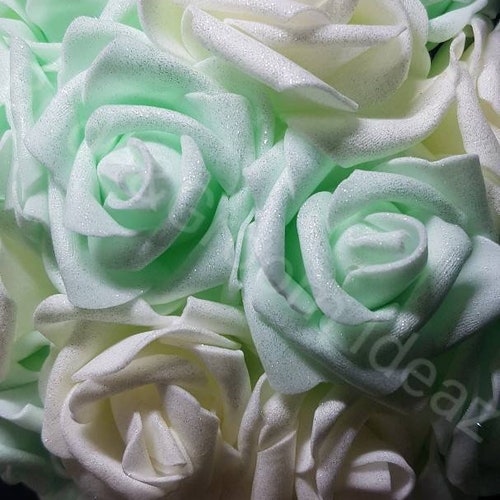 Floral Bouquet for brides and bridesmaids with roses and pearls. Materials used in the making of buy these bouquets are polyester, viscose and R