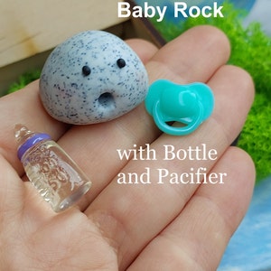 Baby Rock w/Bottle and Pacifier + Adoption Certificate & Moss Box Home! Emotional Support Pet, Gift for Friends, Wooden box with Moss Home