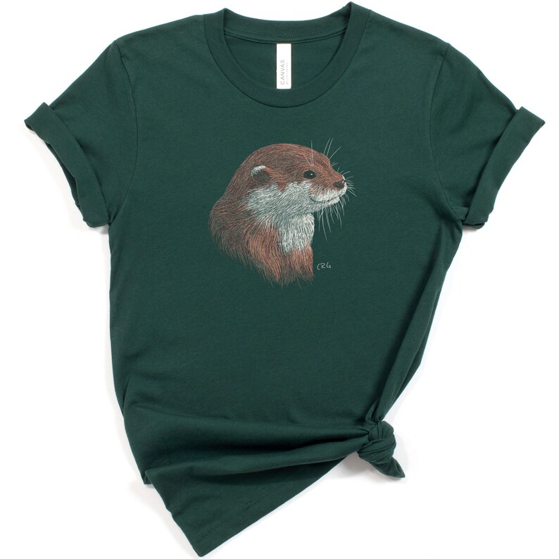 May include: A dark green t-shirt with a brown and white otter illustration on the front. The otter is looking to the right and has a white whisker.