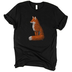 May include: Black t-shirt featuring a graphic of a red fox sitting with its tail curled around its body.