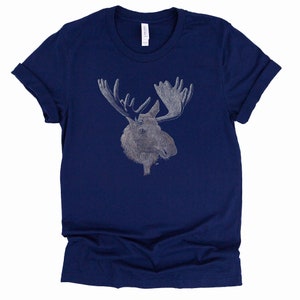 May include: A navy blue t-shirt with a white outline drawing of a moose head.