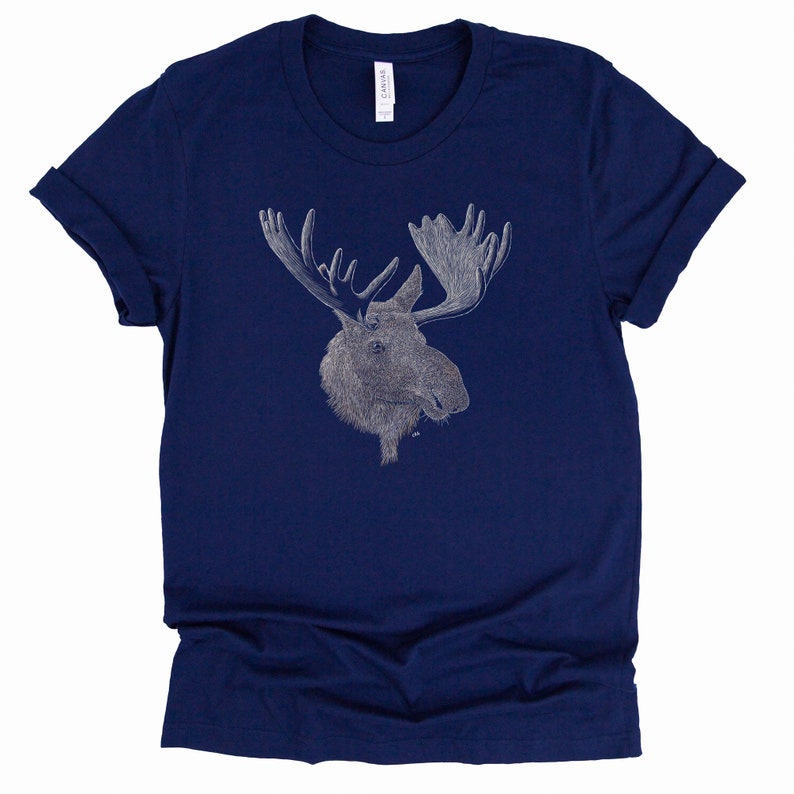 May include: A navy blue t-shirt with a white outline drawing of a moose head.