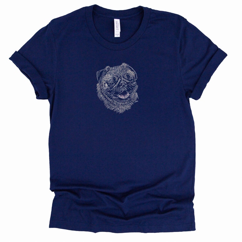 Puede incluir: Una camiseta azul marino con un dibujo de l&iacute;nea blanca de un carlino en la parte delantera.