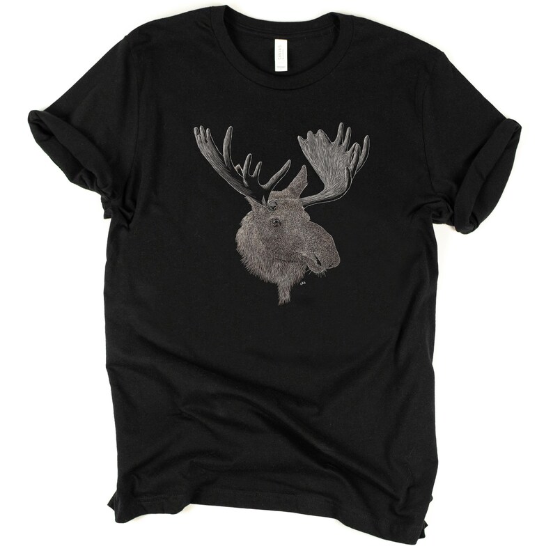 May include: Black t-shirt with a white outline drawing of a moose head.
