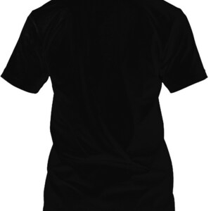 May include: A solid black t-shirt with short sleeves. The shirt is made of a soft material and has a classic crew neck design. The back of the shirt is visible, showcasing the simple, versatile style.