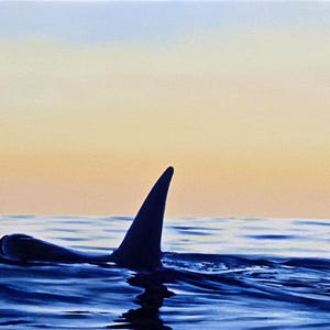 May include: A dark blue orca dorsal fin emerges from deep blue ocean waves against a soft, gradient sunset sky transitioning from pale yellow to light blue. The painting captures the silhouette of the whale in the water with visible brushstrokes.