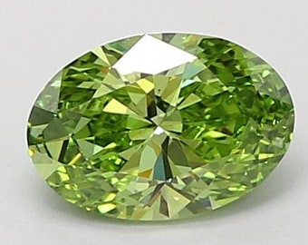 May include: A vibrant green oval-shaped gemstone with a faceted cut. The stone has a high level of brilliance and sparkle.