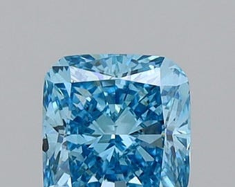 May include: A cushion-cut, light blue gemstone with numerous facets. The gemstone has a square shape with rounded corners and reflects light, creating a sparkling effect. The gem is set against a neutral background.